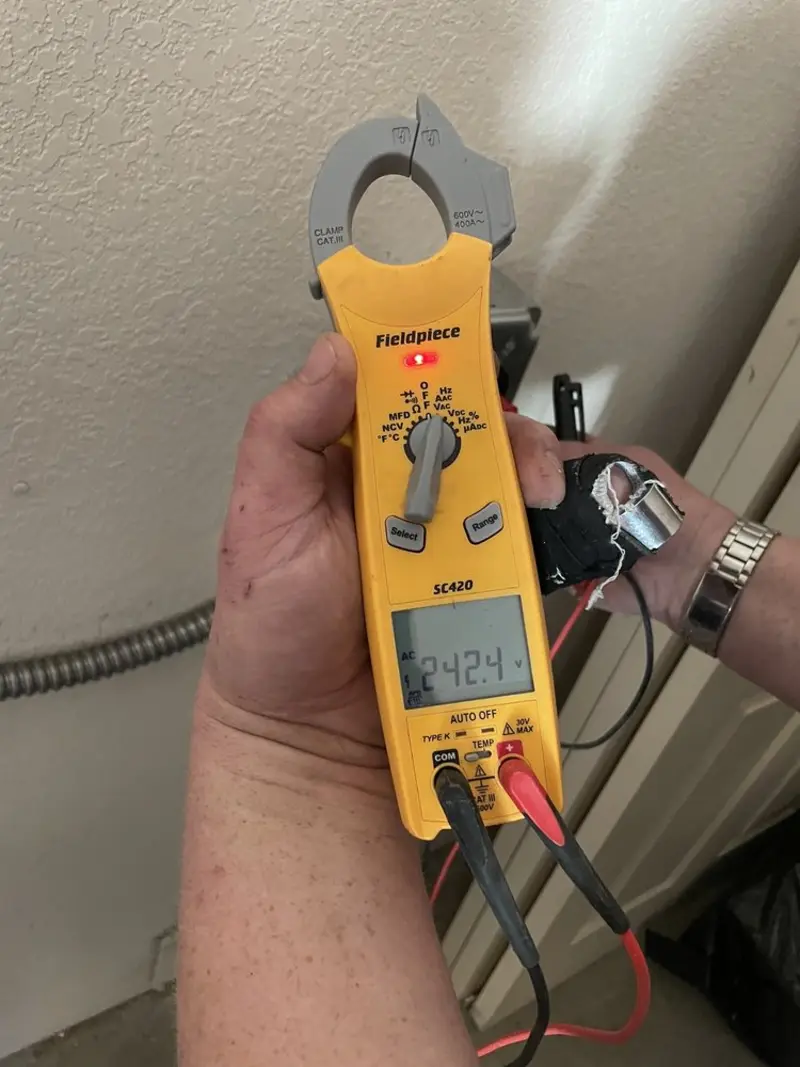 Voltage testing with clamp meter during Whole House Surge Protector in Senoia
